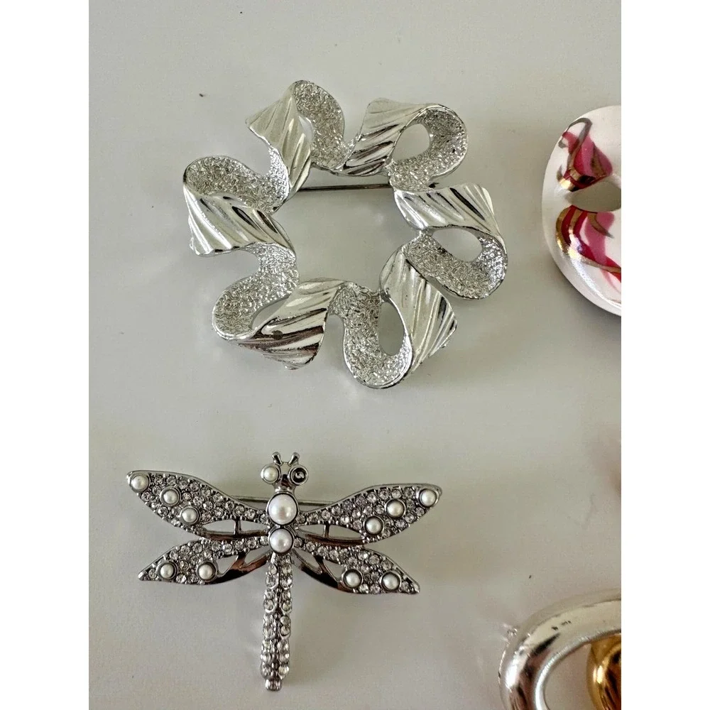 The Unbranded Brand brooch painted